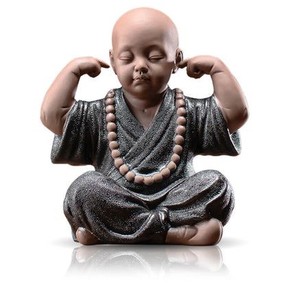 The "Four Foundations of Meditation" - clay monk figures