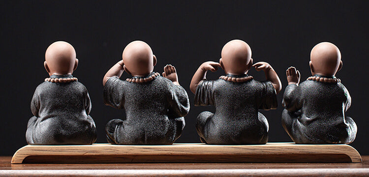 The "Four Foundations of Meditation" - clay monk figures